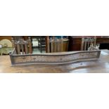 A George III serpentine steel fire curb, width 158cm