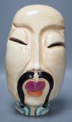 A signed Susie Cooper wall mask of a Chinese gentleman,30 cms high,