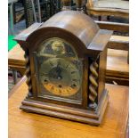 An early 20th century oak 8 day mantel clock, width 30cm, height 35cm