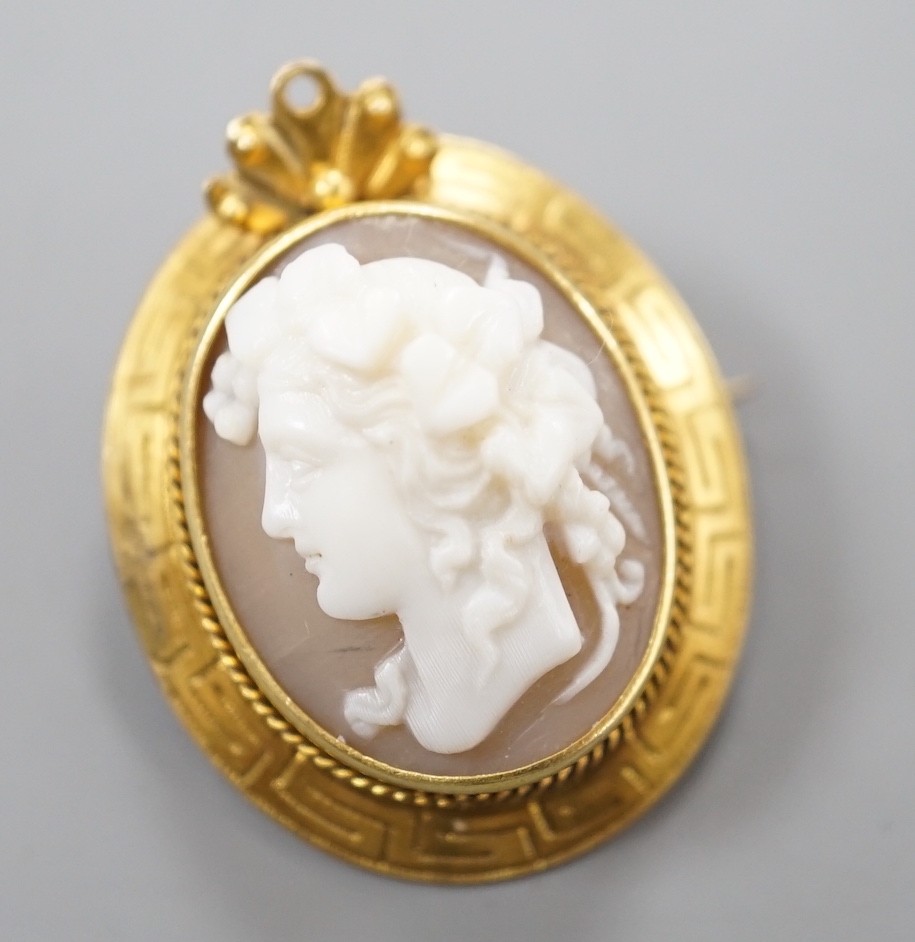 A yellow metal mounted cameo shell brooch, carved with the bust of a lady to dexter, 28mm. - Image 2 of 4