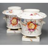 A pair of early 19th century Coalport floral painted ice pails, 29cm