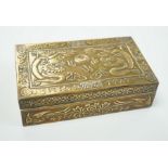 A Chinese brass 'dragon' cigarette box, 15.5cm