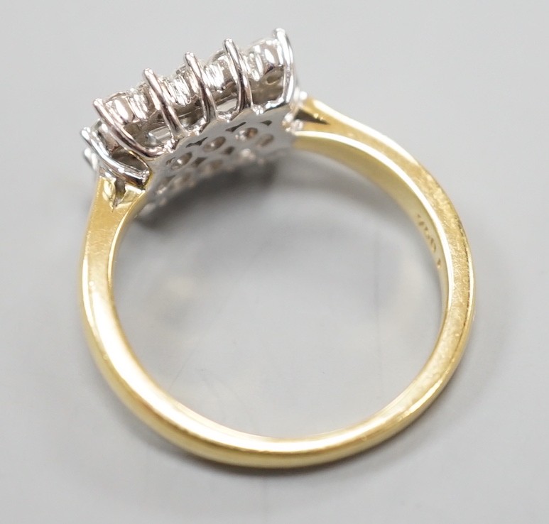 A 750 yellow metal, baguette and round cut diamond set rectangular cluster ring, size M, gross - Image 4 of 6