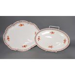 Two Meissen iron red sprig oval trays, largest 27 cms wide,
