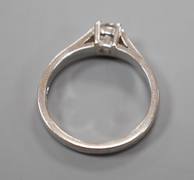 A modern platinum and solitaire diamond ring, size M, gross weight 5.2 grams, the stone diameter 4. - Image 4 of 6