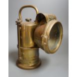 A LNWR railway inspection lamp, company ceased trading in 1922, 26cms high