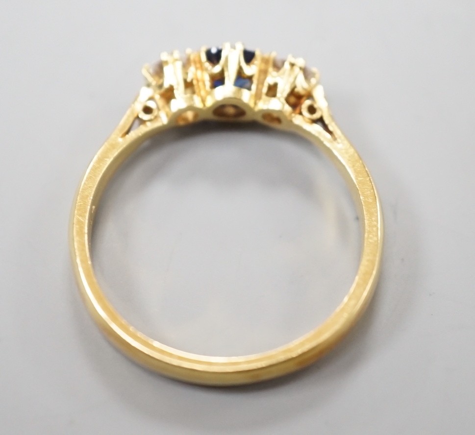 A modern 18ct gold, sapphire and diamond set three stone ring, size S, gross weight 4.4 grams, the - Image 4 of 4