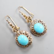 A pair of early 20th century pierced yellow metal and turquoise set drop earrings, 35mm, gross