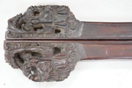 A pair of 19th century Chinese carved hardwood rails, 93cm