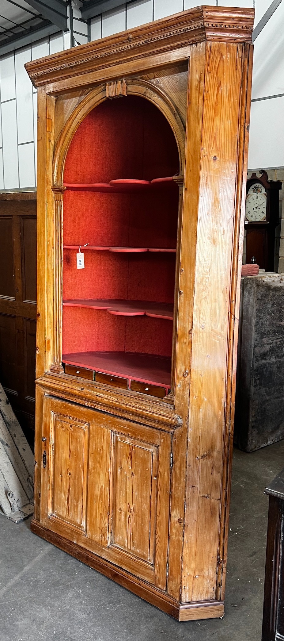 A George III pine barrel back standing corner cabinet, width 116cm depth 50cm height 220cm