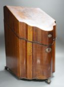 A George III mahogany knife box, with ball and claw feet, 38cms high