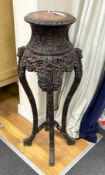 A Chinese carved hardwood marble topped vase stand, height 104cm