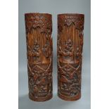 A pair of Chinese carved bamboo brush pots,35 cms high,