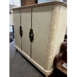 An early 20th century French brass mounted oak compactum wardrobe, width 196cm depth 56cm height