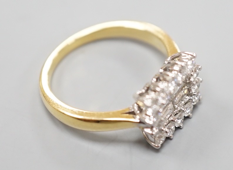 A 750 yellow metal, baguette and round cut diamond set rectangular cluster ring, size M, gross - Image 5 of 6