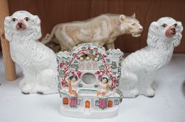 A Royal Dux tiger, a pair of Staffordshire Spaniels and a figural flat back,tiger 48 cms high,