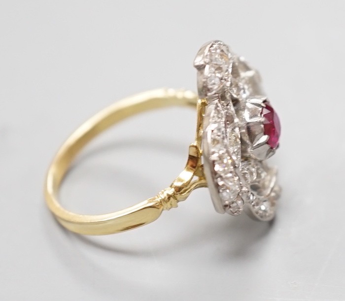 A yellow metal, ruby and diamond cluster set dress ring, in a pierced scroll setting, size O, - Image 5 of 5