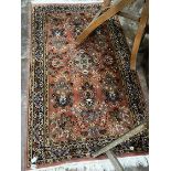 A North West Persian peach ground rug, 160 x 93cm