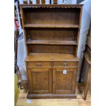 A mid 20th century oak miniature kitchen dresser, width 59cm, depth 21cm, height 108cm