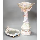 A German floral encrusted porcelain centrepiece and similar easel mirror, tallest 46cm