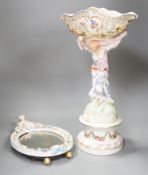 A German floral encrusted porcelain centrepiece and similar easel mirror, tallest 46cm