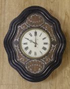A 19th century French wall clock, with mother of pearl decorative face, 62 cms high x 50 cms wide,