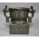 An archaistic Chinese bronze vase after the antique, modelled as an original bronze in the