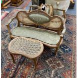 An early 20th century French caned beech four piece salon suite, settee length 130cm, height 86cm