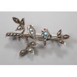 An early 20th century, yellow and white metal, turquois and marcasite set bar brooch, modelled as