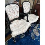 A pair of ebonised faux bamboo elbow chairs, width 58cm depth 50cm height 90cm