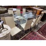A contemporary rectangular glass topped dining table, length 199cm, depth 107cm, height 78cm and a