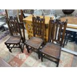 A set of eight 18th century style oak wood seat dining chairs two with arms