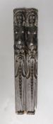 A pair of 18th century French carved walnut appliques,39.5 cms long,