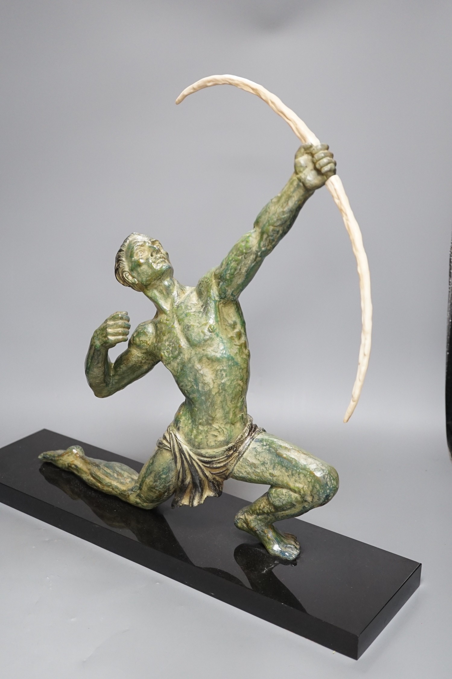 A large Art Deco bronzed figure of an archer, on black marble stand,55 cms wide, - Image 2 of 4