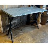 A rectangular cast iron and reconstituted marble garden table, length 120cm, height 60cm