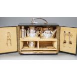 Christopher Dresser for Hukin and Heath, a silver plated travelling picnic / teaset, in suede
