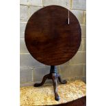 A George III circular mahogany tilt top tea table, diameter 77cm, height 71cm