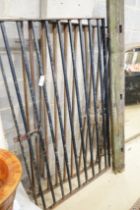 A pair of small wrought iron gates, each width 93cm, height 160cm