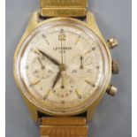 A gentleman's mid 20th century Lemania 105 steel and gold plated chronograph wrist watch, on