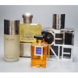 Oversized advertising perfume display bottles including Celine, Cacharel pour Homme, Arpege Lavin