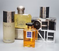 Oversized advertising perfume display bottles including Celine, Cacharel pour Homme, Arpege Lavin