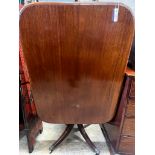 A Regency rectangular mahogany tilt top table, width 106cm, depth 78cm, height 71cm