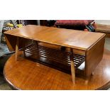 An Ercol elm drop flap coffee table, length 106cm, depth 45cm, height 36cm