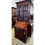 A George III style narrow mahogany bureau bookcase, width 75cm, depth 51cm, height 208cm