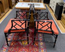 A pair of Regency style lacquer lattice back elbow chairs (one a.f.), width 56cm, depth 49cm, height