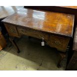 A Queen Anne revival walnut kneehole table, length 92cm, depth 53cm, height 76cm