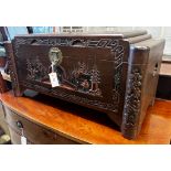 A small Chinese carved camphorwood trunk, length 80cm, depth 38cm, height 40cm