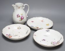 A group of three 18th century Meissen flower painted dishes and a similar late 18th century Vienna