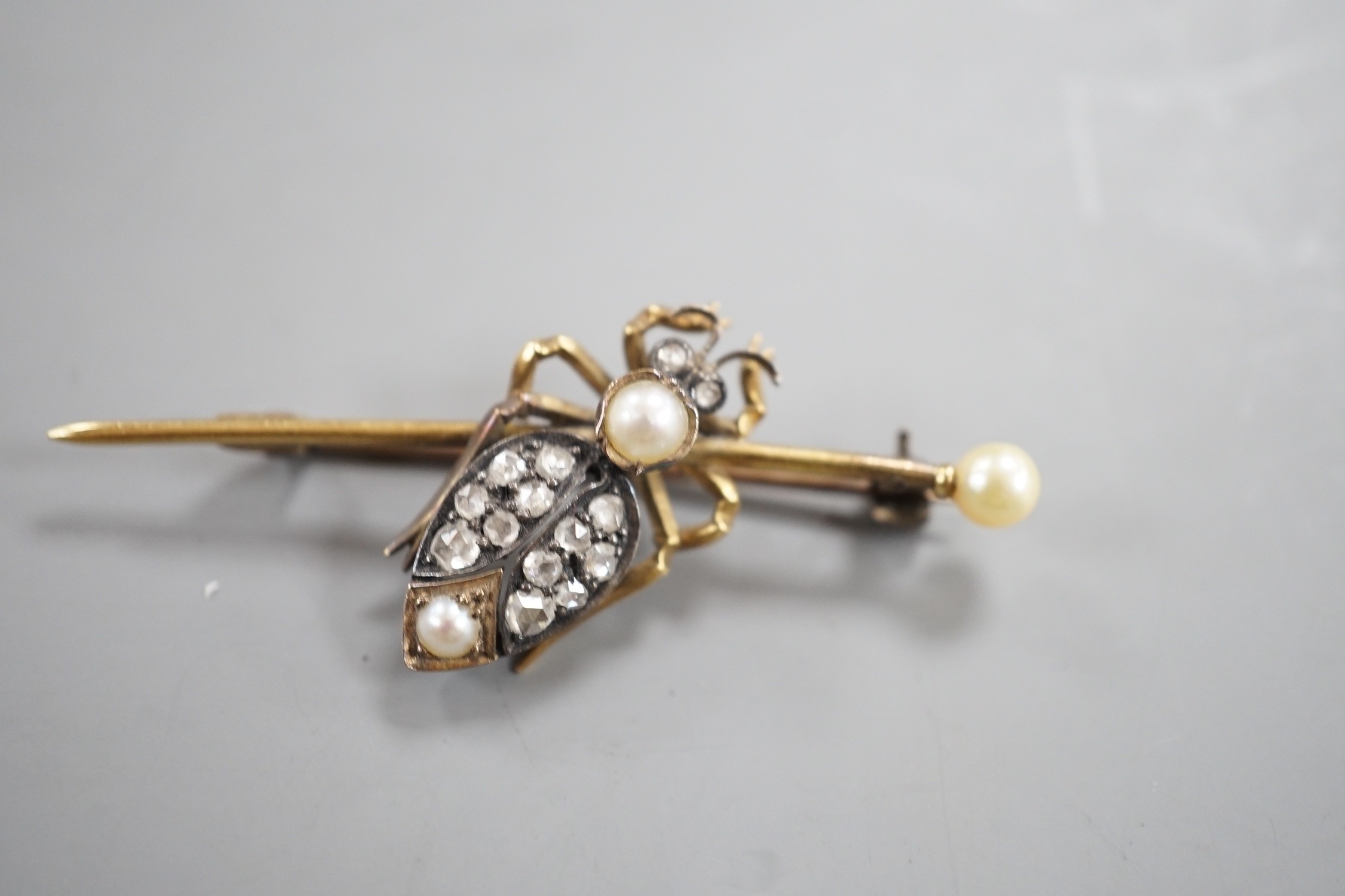 An early 20th century white and yellow metal, rose cut diamond and split pearl cluster set bug bar - Image 2 of 3