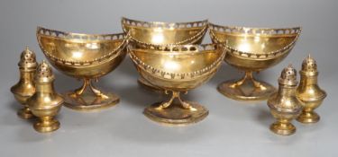 A set of four 20th century Spanish gilt white metal boat shaped pedestal bowls, with pierced